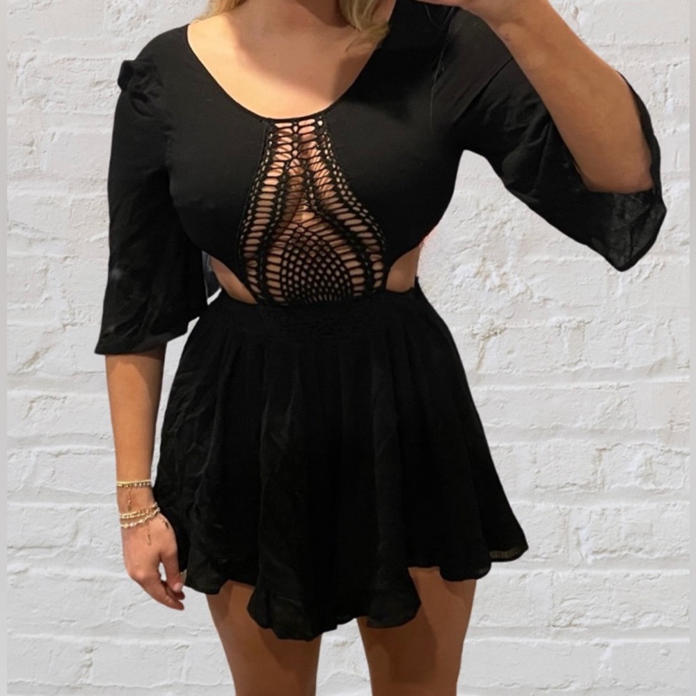 Black cut-out, open back romper from boutique in Bradley Beach
